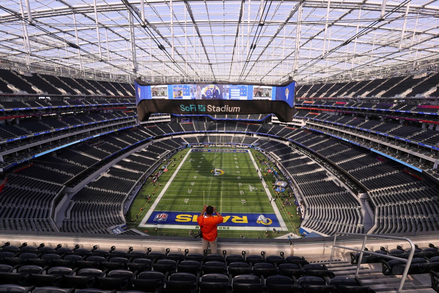 high end stadium seating crossword